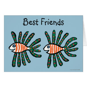 Poissons jumeaux verts et oranges d'aileron