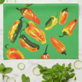 Poivrons baignés de soleil sur une serviette de cu (Plié)
