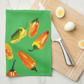 Poivrons baignés de soleil sur une serviette de cu (Quart Plié)