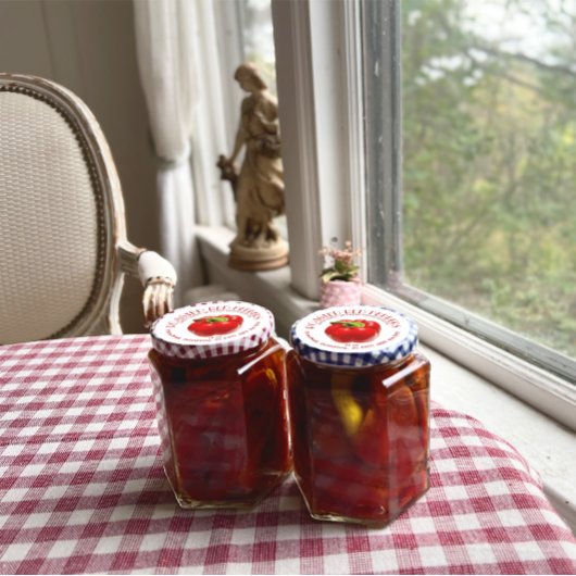 Poivrons rouges rôtis en Étiquette d'ail et d'huil