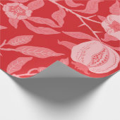 Pomegranaat in kerstrood cadeaupapier (Hoek)