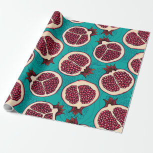 Pomegranaatplakken op turquoise cadeaupapier