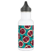 Pomegranaatplakken op turquoise waterfles (Links)