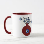 pomegranate with evil eye mug<br><div class="desc">Pomegranate in many cultures symbolizes abundance,  blessing,  fertility,  and immortality. And the evil eye to ward of the negativity when you begin your day with a coffee in this unique mug.</div>