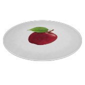 Pomme rouge sur planche à découper blanche (Coin)