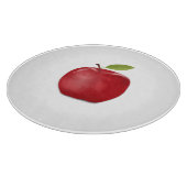 Pomme rouge sur planche à découper blanche (Coin)