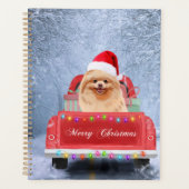 Pommeraanse hond op sneeuw in kerstmis planner (Voorkant)