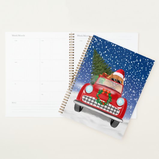 Pommeren die met sneeuwkerst rijden planner (Display)