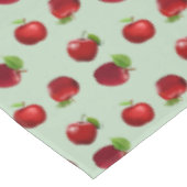 Pommes rouges sur une nappe vert clair (Angle)