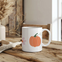 Pompoen en bloemen in de herfst