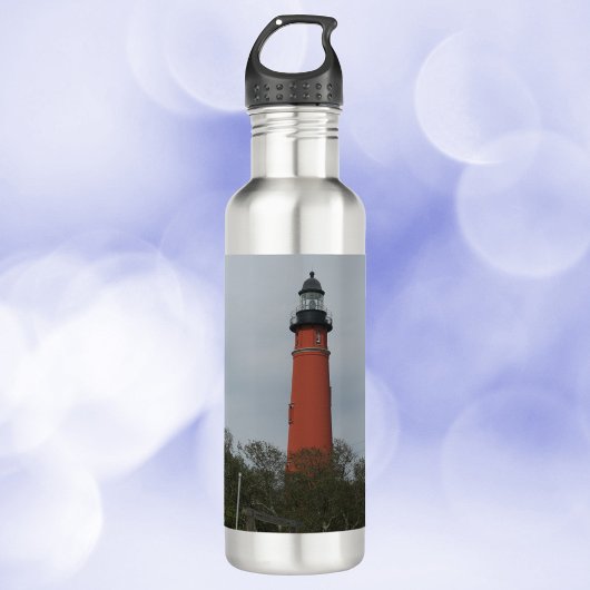 Ponce Inlet Lighthouse boven de bomen Foto Waterfles