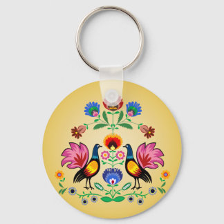 Poolse folk met decoratieve bloemen en cokerels sleutelhanger