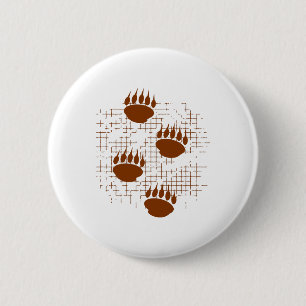 Pootafdrukken van een berenwelp op een versleten a ronde button 5,7 cm
