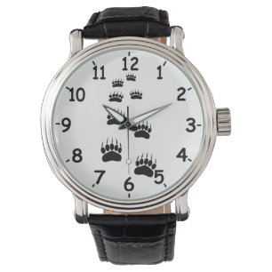 Pootafdrukken van zwarte beren horloge