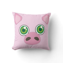 Porc mignon avec le coussin de rose de yeux verts