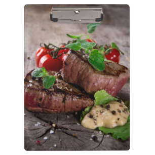 Porte-bloc Biftecks grillés de BBQ avec les herbes et les