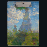 Porte-bloc Claude Monet Femme avec un parasol<br><div class="desc">Apportez le charme impressionniste à chaque tâche. Ce porte - bloc présente la Femme de Claude Monet avec un Parasol, peint en blanc tendre, vert frais, et blues aérés. Le design élégant transforme un simple accessoire de bureau en un chef-d'oeuvre miniature. Durable et fonctionnel, il est idéal pour les salles...</div>