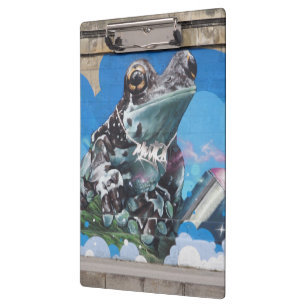 Porte-bloc Grenouille fraîche entre le graffiti de boîtes de