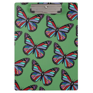 Porte-bloc Motif de papillon coloré assez orné sur fond vert
