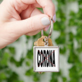 Porte-clé carré Premium CORONA X (main)