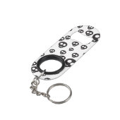 Porte-clé Décapsuleur Motif avec les crânes noirs sur le blanc (angle arrière)