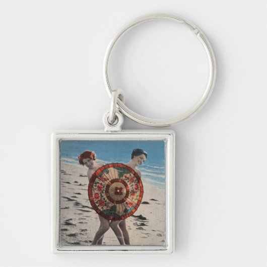 Porte-clés 2 femmes bronzantes et parapluie asiatique, Florid (Devant)