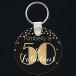 Porte-clés 50 and Fabulous Gold Personalized Birthday Party<br><div class="desc">Celebrate turning 50 in style with this modern 50th birthday design. The word 50 is in a classic faux gold glitter ritz typography with the personalized name & Fabulous in a white text on a black background. You can personalize this gift by changing the name to whatever you like. To...</div>