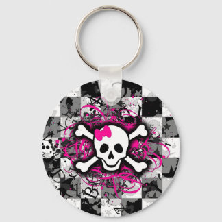 Porte-clés à damiers Crâne avec éclaboussure rose