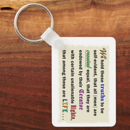 Porte-clés A keychain with a declaration. (Recto)