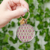 Porte-clés A round keychain features a detailed floral (Main)