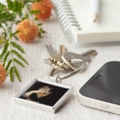 Porte-clés À un livre (Côté)