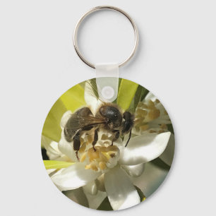 Porte-clés abeille sur fleur d'orange