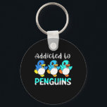 Porte-clés Addicité Aux Pingouins<br><div class="desc">Addicité Aux Pingouins</div>