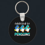 Porte-clés Addicité Aux Pingouins<br><div class="desc">Addicité Aux Pingouins</div>