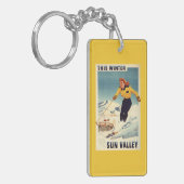 Porte-clés affiche de sourire et de ski de femme (Devant gauche)