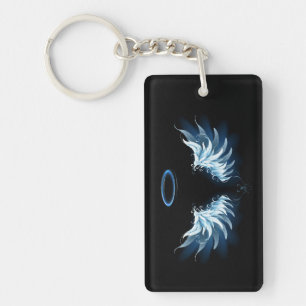 Porte-clés Ailes d'ange bleues lumineuses sur fond noir