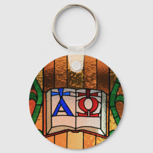 Porte-clés Alpha art en verre souillé de livre d'Omega