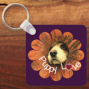 Porte-clés Amour de chiot sortant d'une fleur