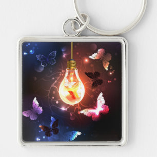 Porte-clés Ampoule lumineuse avec papillons nocturnes