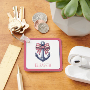 Porte-clés Ancre bleu marine avec arc à rayures rouge et blan