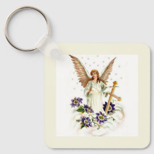 Porte-clés Ange avec croix et fleurs de clématite 