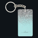 Porte-clés Aqua bleu Turquoise Parties scintillant argent Mon<br><div class="desc">Aqua Blue - Turquoise et Silver Sparkle Parties scintillant Script Monogramme Nom Porte - clé. Cela rend le cadeau parfait pour 16 ans,  mariage,  douche nuptiale,  anniversaire,  baby shower ou bachelorette pour quelqu'un qui aime le luxe glam et les styles chic.</div>