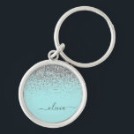 Porte-clés Aqua bleu Turquoise Parties scintillant argent Mon<br><div class="desc">Aqua Blue - Turquoise et Silver Sparkle Parties scintillant Script Monogramme Nom Keychains (Porte - clé). Cela rend le cadeau parfait pour 16 ans,  mariage,  douche nuptiale,  anniversaire,  baby shower ou bachelorette pour quelqu'un qui aime le luxe glam et les styles chic.</div>