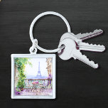 Porte-clés Aquarelle Tour Eiffel Paris Café français<br><div class="desc">Aquarelle Tour Eiffel Paris Café Porte - clé propose un coin salon de café français couleur aquarelle avec Paris et la Tour Eiffel en arrière - plan. Créé par Evco Studio www.zazzle.com/store/evcostudio</div>