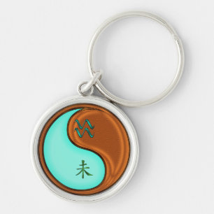 Porte-clés Aquarius et chèvre du bois