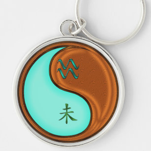 Porte-clés Aquarius et chèvre du bois