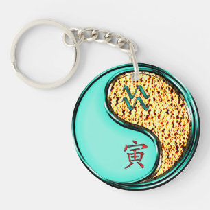 Porte-clés Aquarius et Tigre de Feu