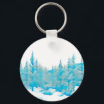 Porte-clés Arbres bleus neigeux<br><div class="desc">Image monotone bleue stylisée de conifères recouverts de neige.</div>