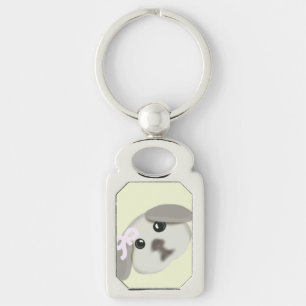 Porte-clés argenté en forme de chiot blanc mignon