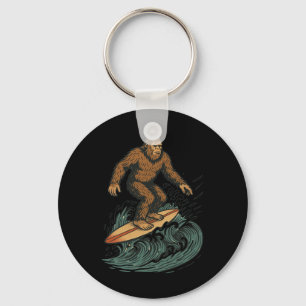 Porte-clés Art Cryptide de plage rétro de Bigfoot surfant pou